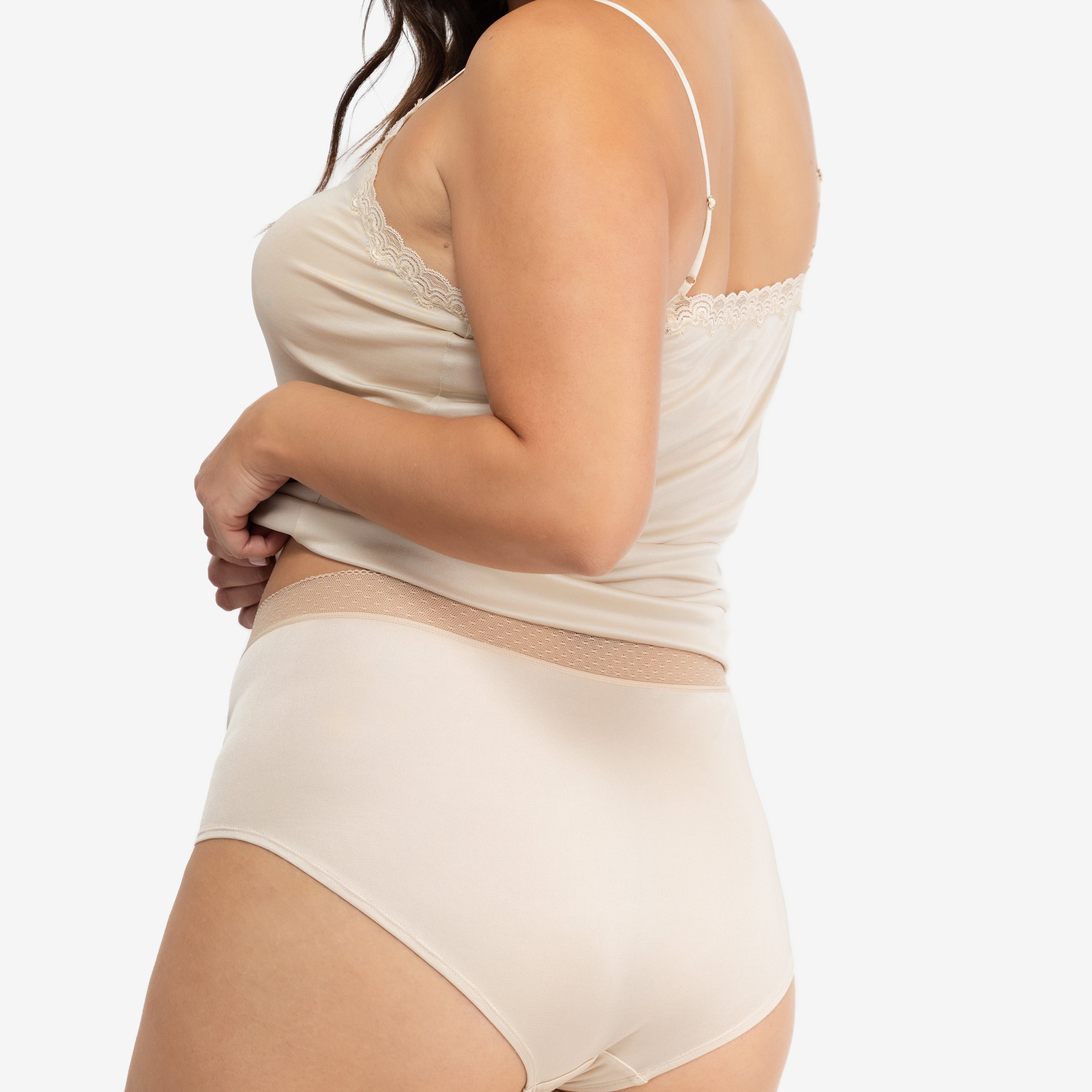 Model Wearing Uwila Warrior HIgh-Waist Silk Briefs Underwear in Smoke Grey on White Background
