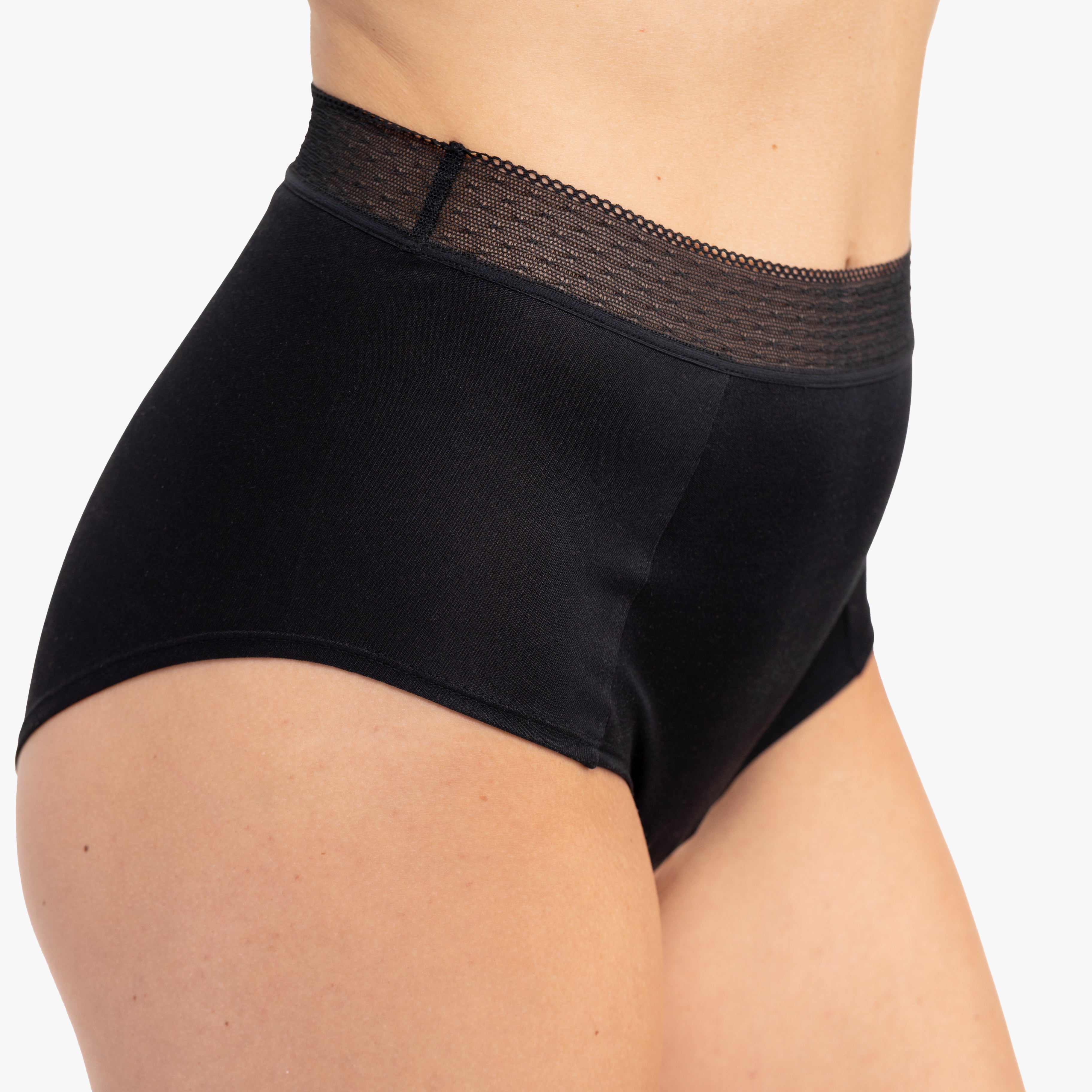 Model Wearing Uwila Warrior HIgh-Waist Silk Briefs Underwear in Tap Shoe Black on White Background