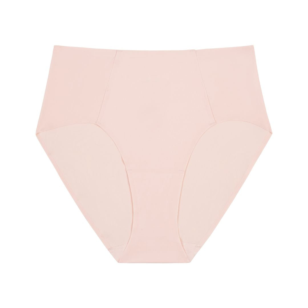 Flat Lay of Uwila Warrior Soft Seamless Brief in Rose Quartz on white background.