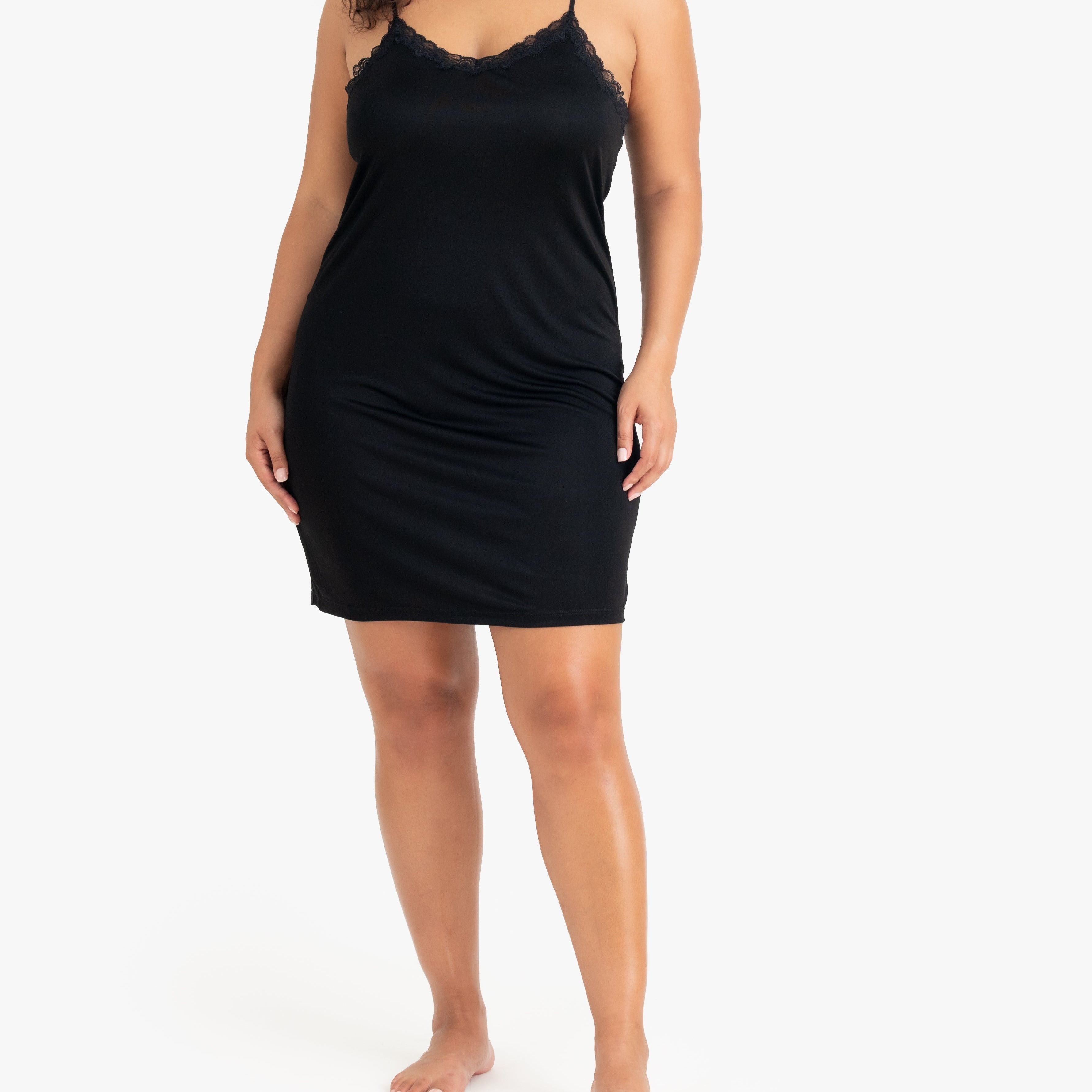 Model wearing Uwila Warrior Silk Blend Slip in Tap Shoe Black on White Background