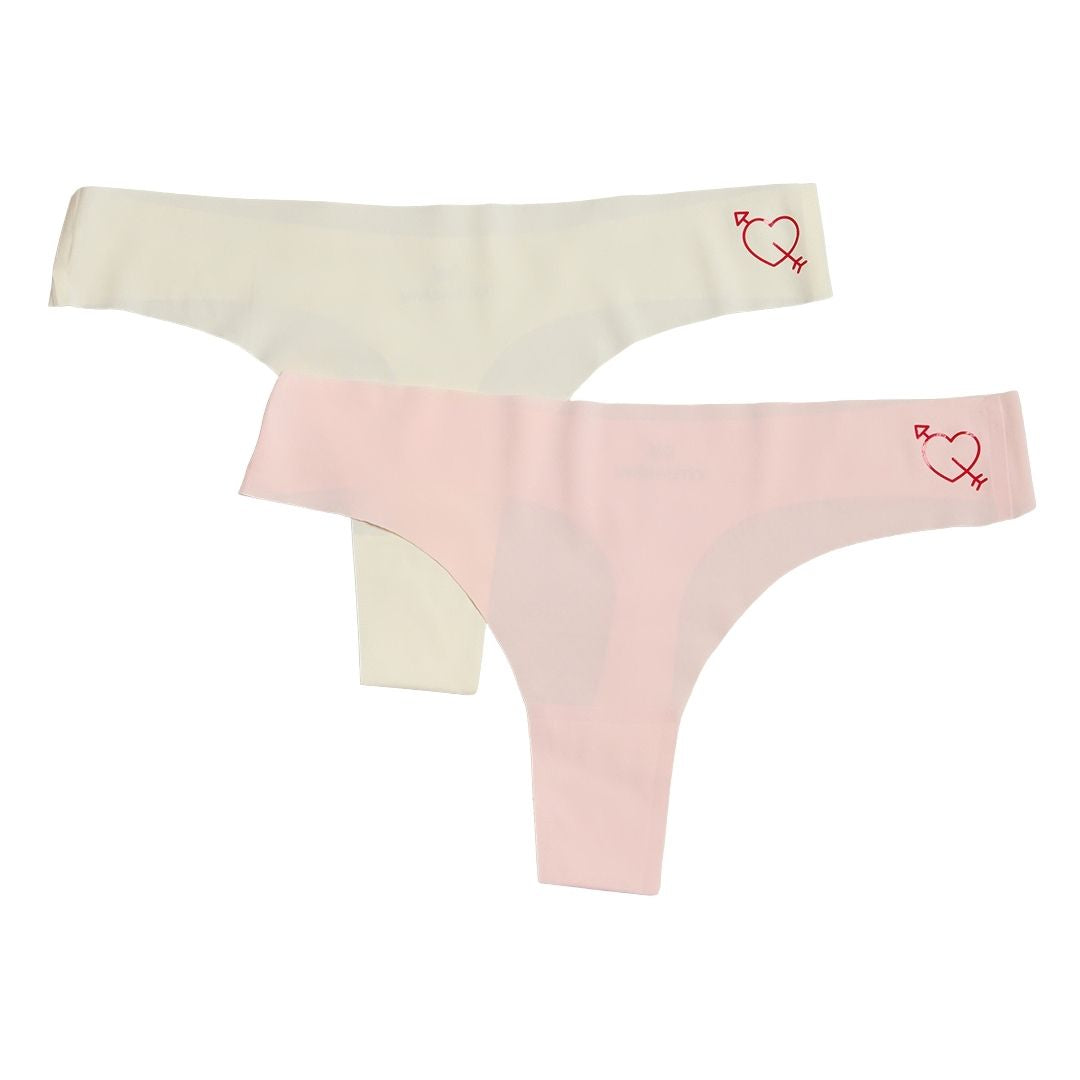 Winter White and Rose Quartz Soft Seamless Thong set with heart decal on white background.