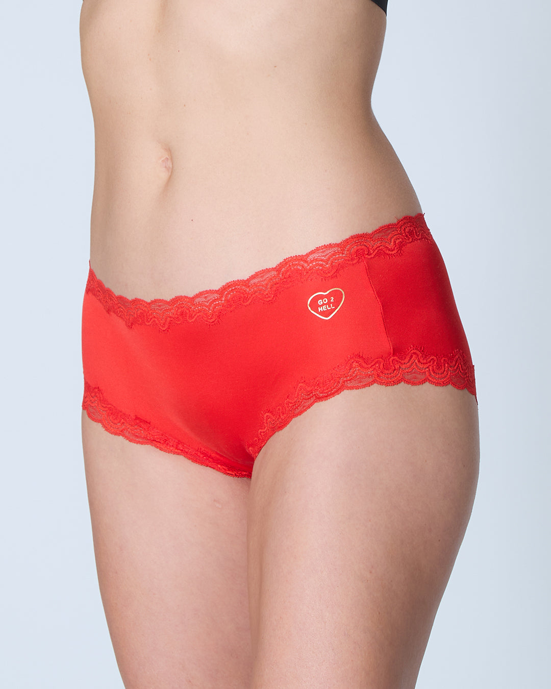 Uwila Warrior Red Soft Silk Briefs with lace featuring a heart design on a plain background