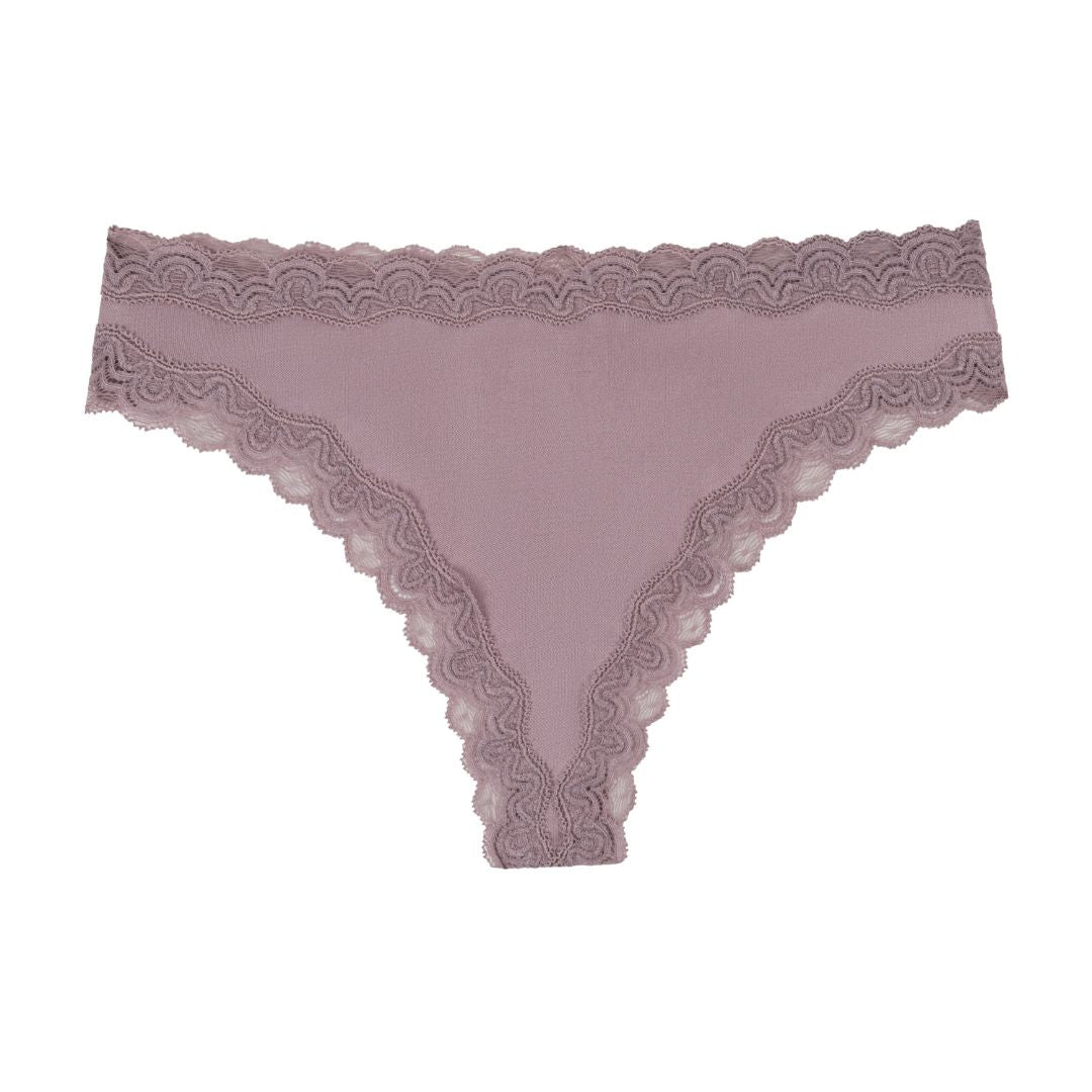 Still life of Uwila Warrior Soft Silks Thong Underwear in Nirvana on White Background