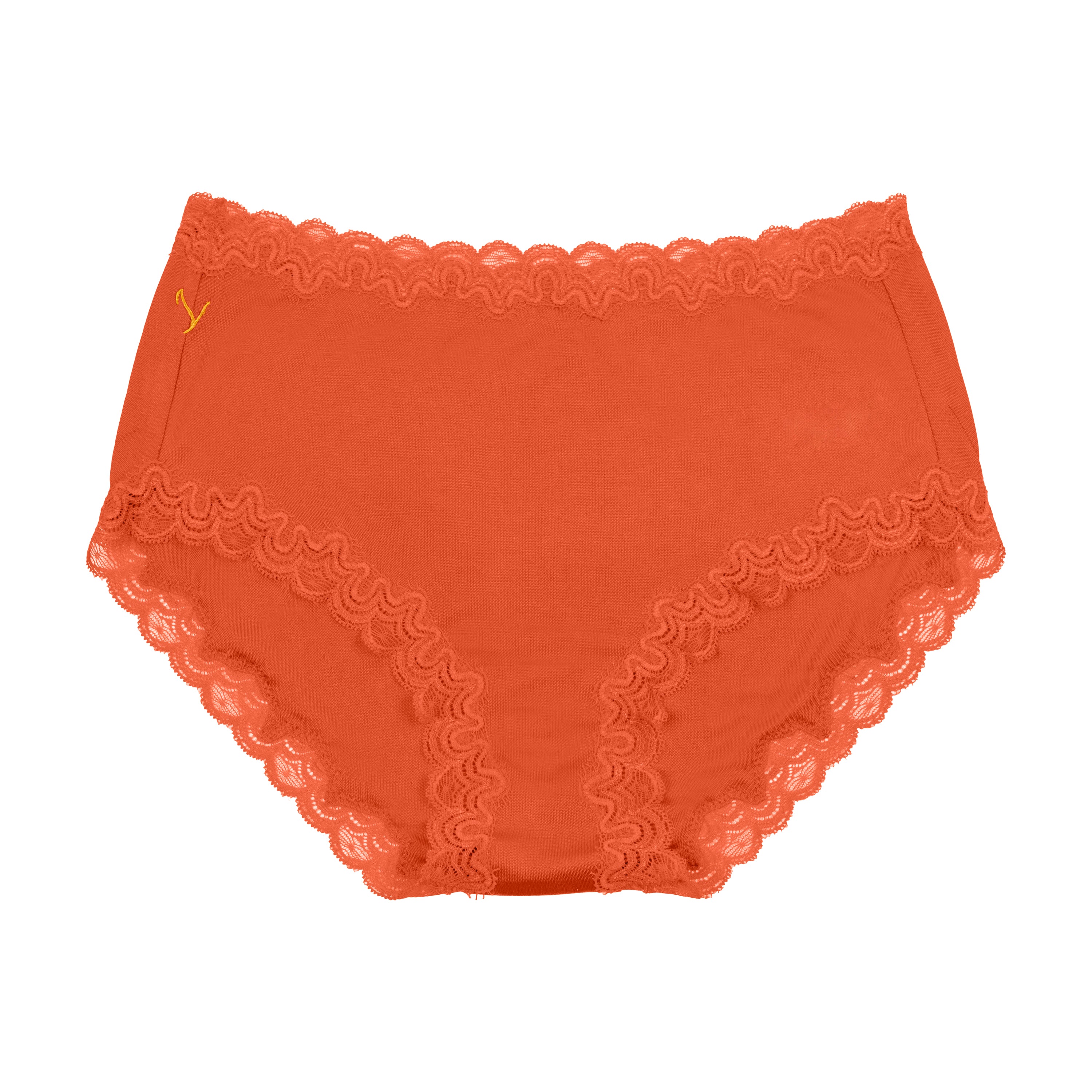Still life of Uwila Warrior Soft Silks Briefs Underwear in Spicy Orange on White Background