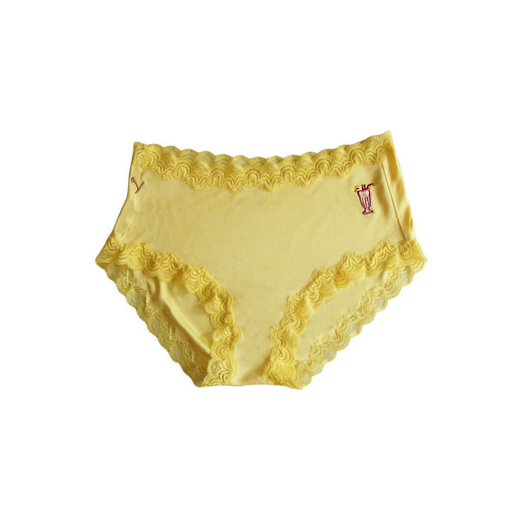 Yellow lace-trimmed underwear on a white background