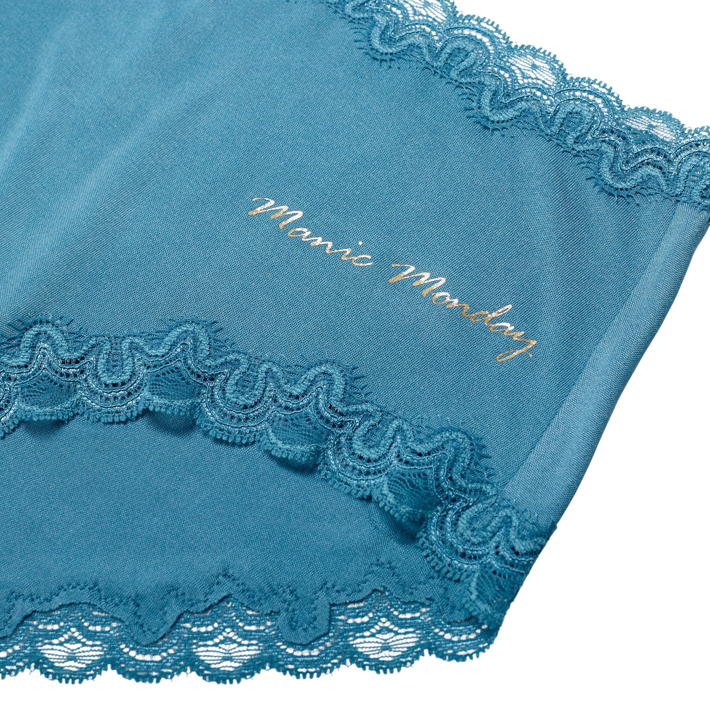 Still life of Soft Silk 'Manic Monday' Brief against a white background.