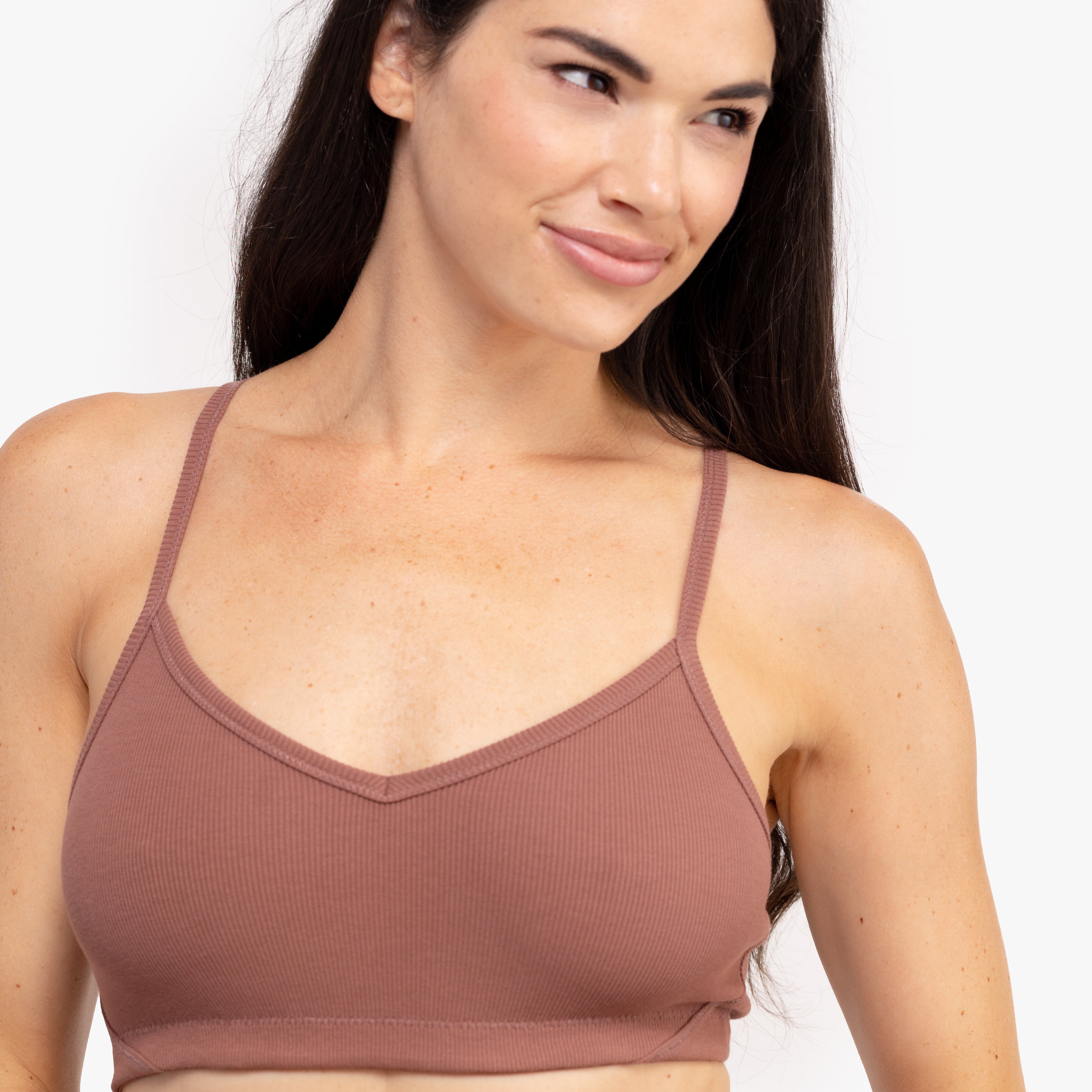 Model wearing a toffee bralette on a white background.