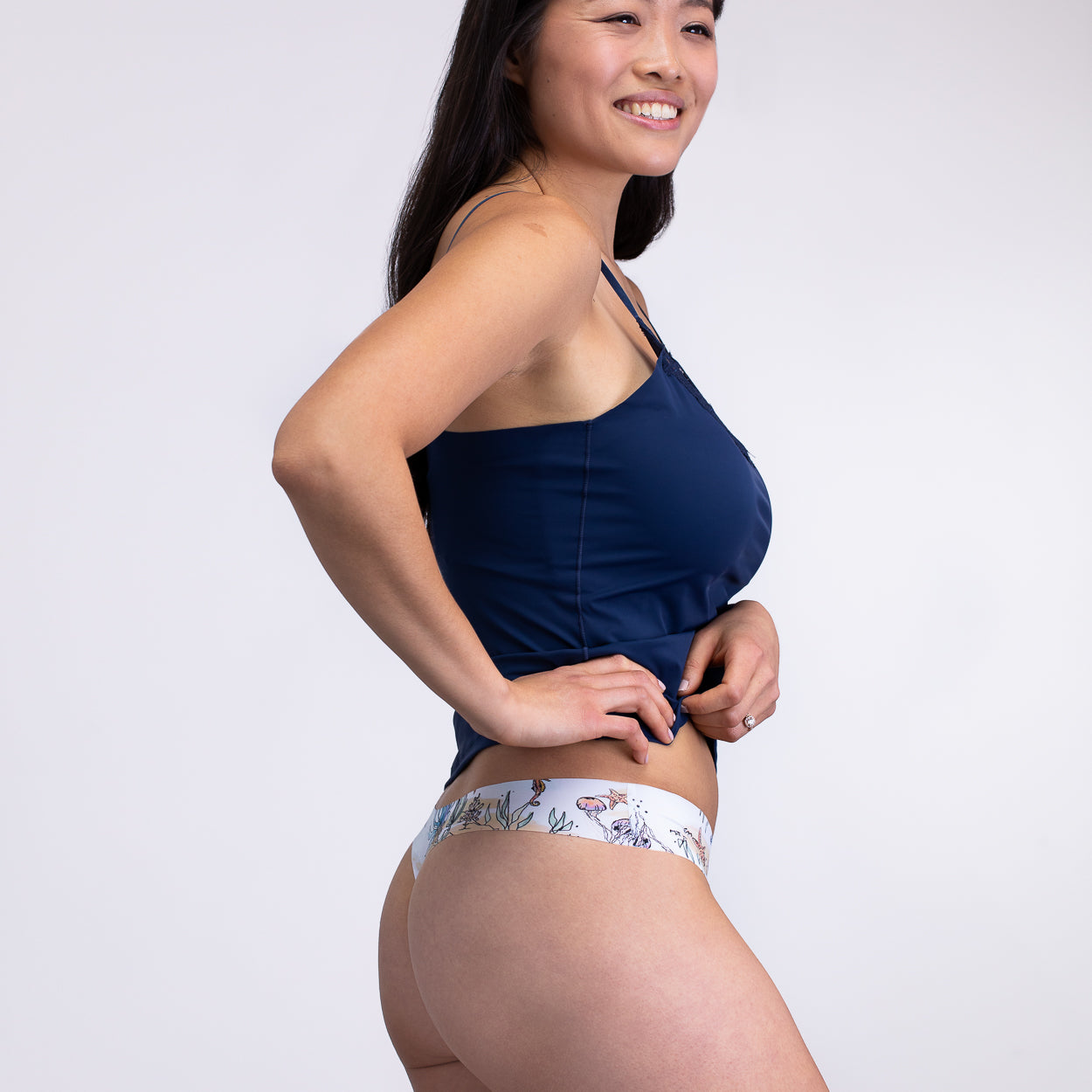 Model wearing Sea Print Soft Seamless thong on white background.