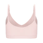 A rose quartz underwire-free soft bra with adjustable straps and removable cup inserts on white background.