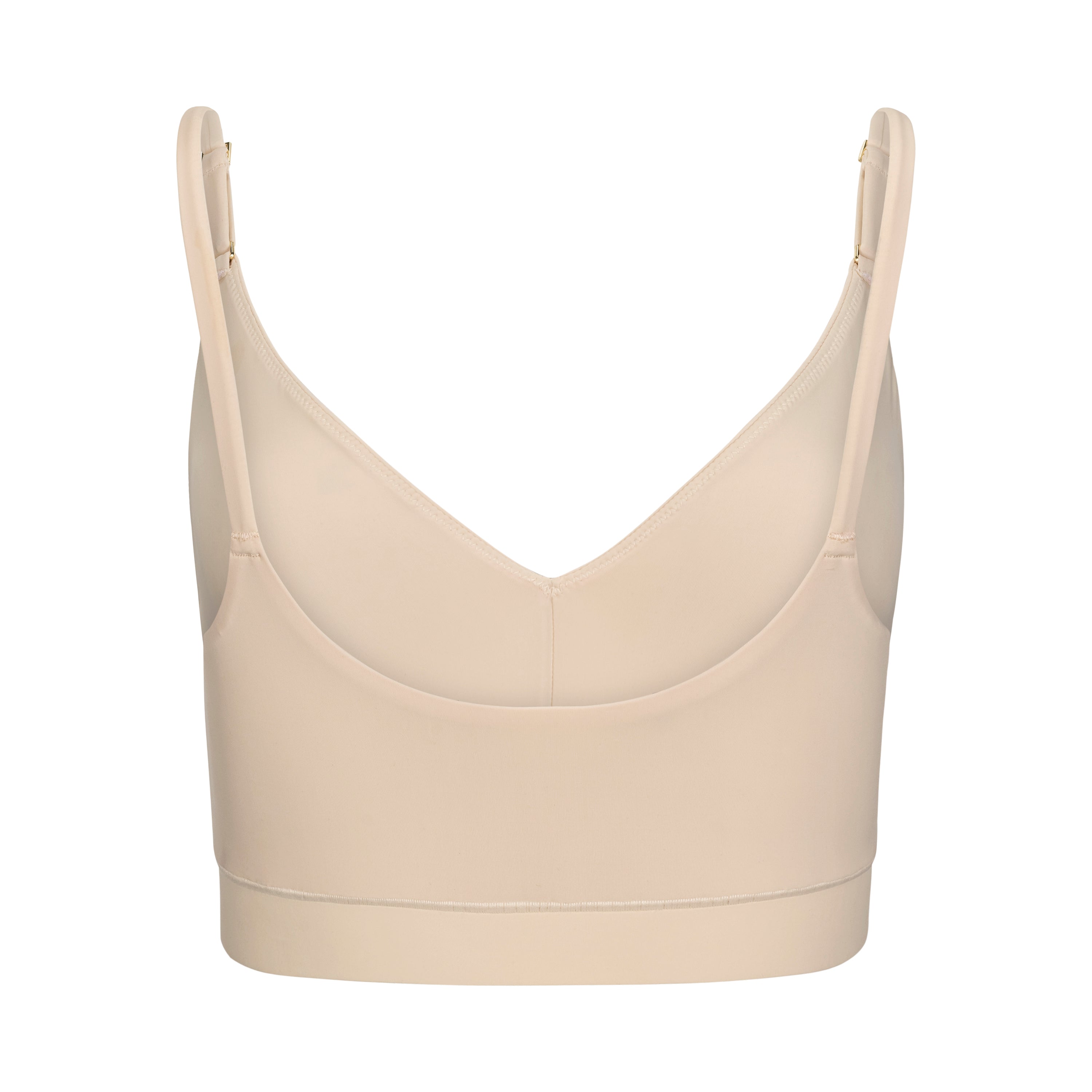 A smoke grey, underwire-free soft bra with adjustable straps and removable cup inserts.
