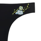 A soft seamless tap shoe black thong underwear with an embroidered floral pattern in contrasting colors against white background.