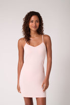Model wearing Uwila Warrior Soft Seamless Slip in Rose Quartz. 