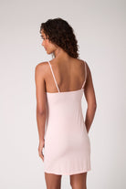 Model wearing Uwila Warrior Soft Seamless Slip in Rose Quartz