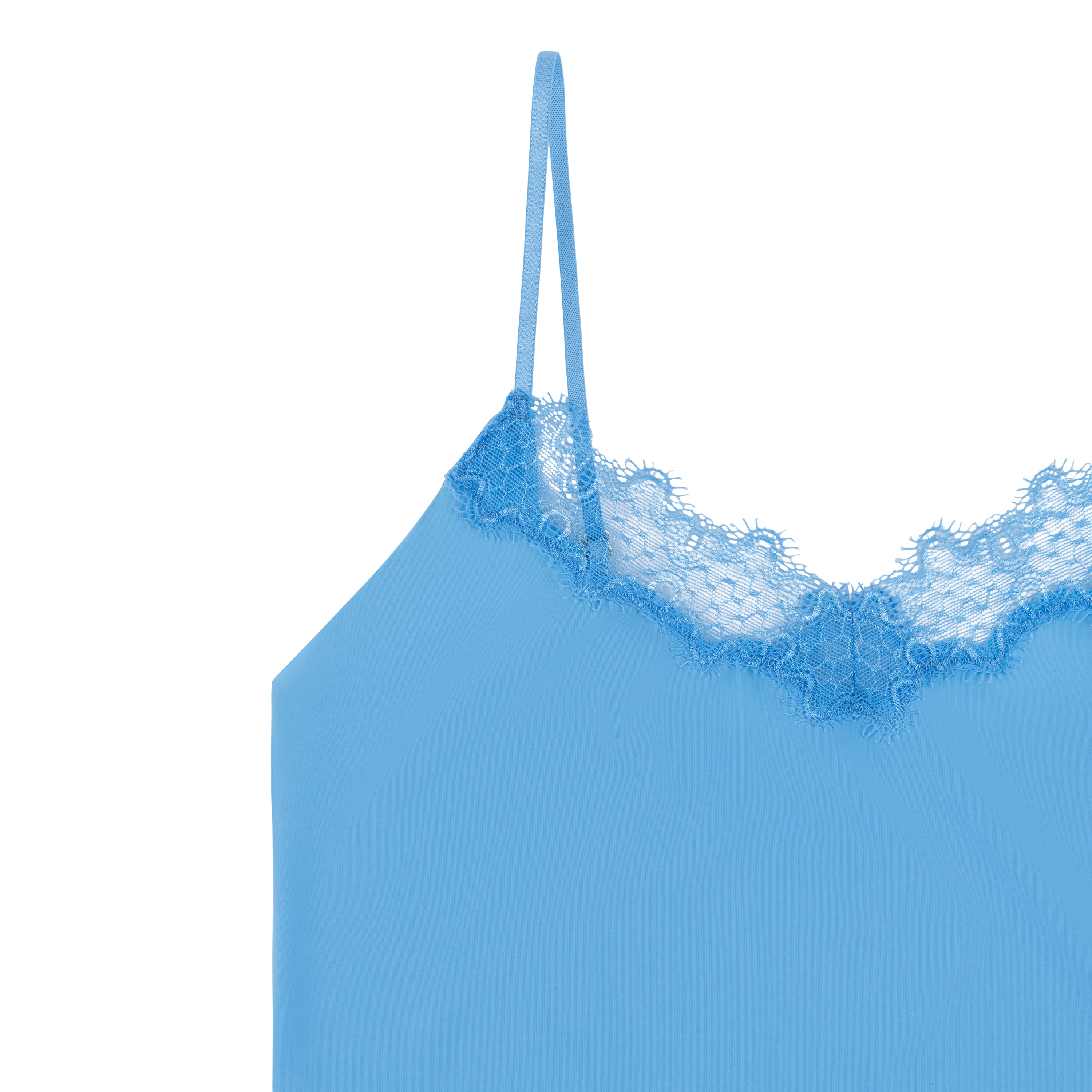 A light blue soft seamless camisole top with delicate lace detail at the neckline, with adjustable straps.