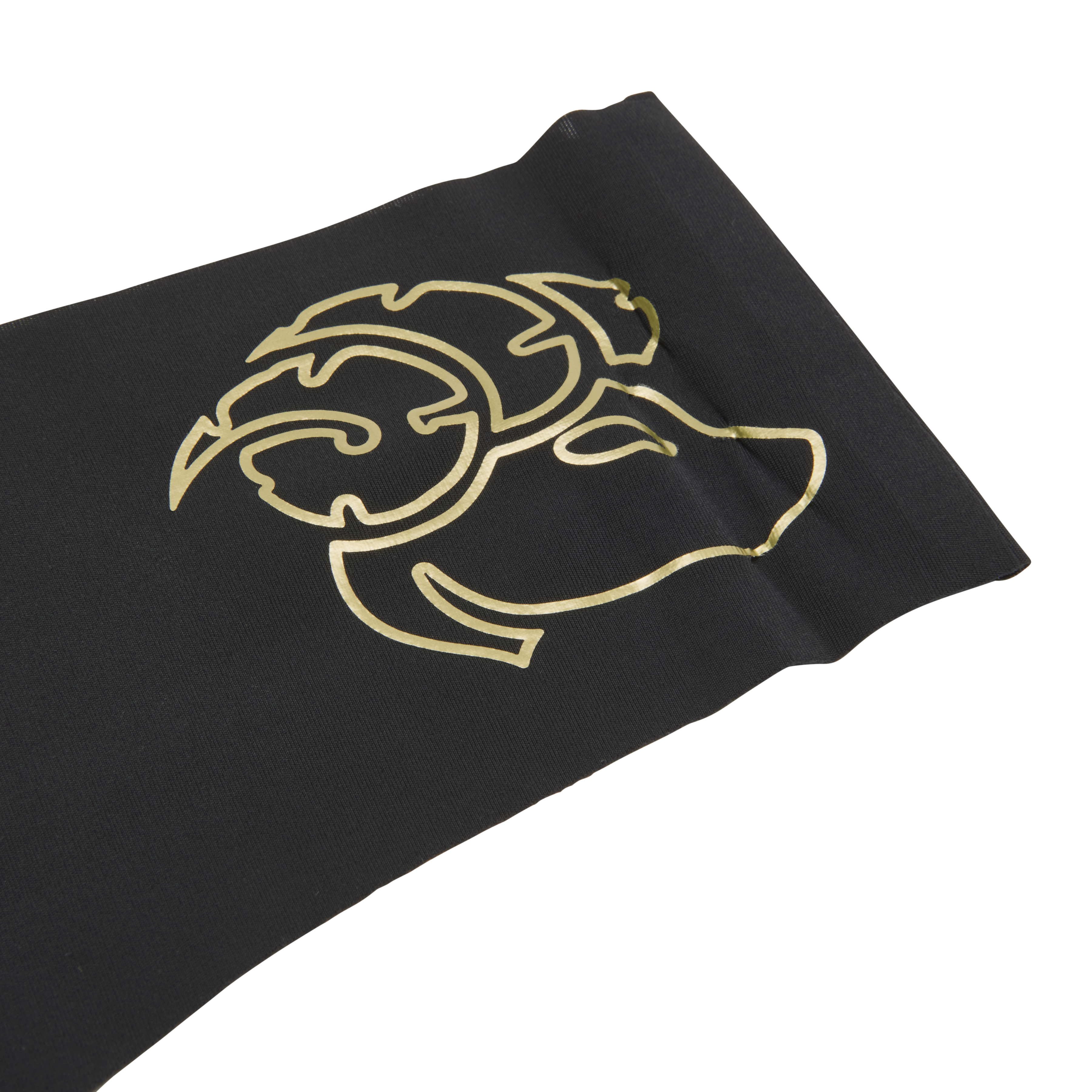 This image features a sleek, black thong with a distinctive metallic gold decal of a zodiac sign on the waistband. The thong is designed with a cotton gusset for superior hygiene and is constructed with thermowelded side seams and removable tags for comfort.