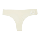 This image features a sleek white thong with a distinctive metallic silver decal of a zodiac sign on the waistband. The thong is designed with a cotton gusset for superior hygiene and is constructed with thermowelded side seams and removable tags for comfort.