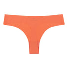 An orange soft seamless thong underwear on white background.