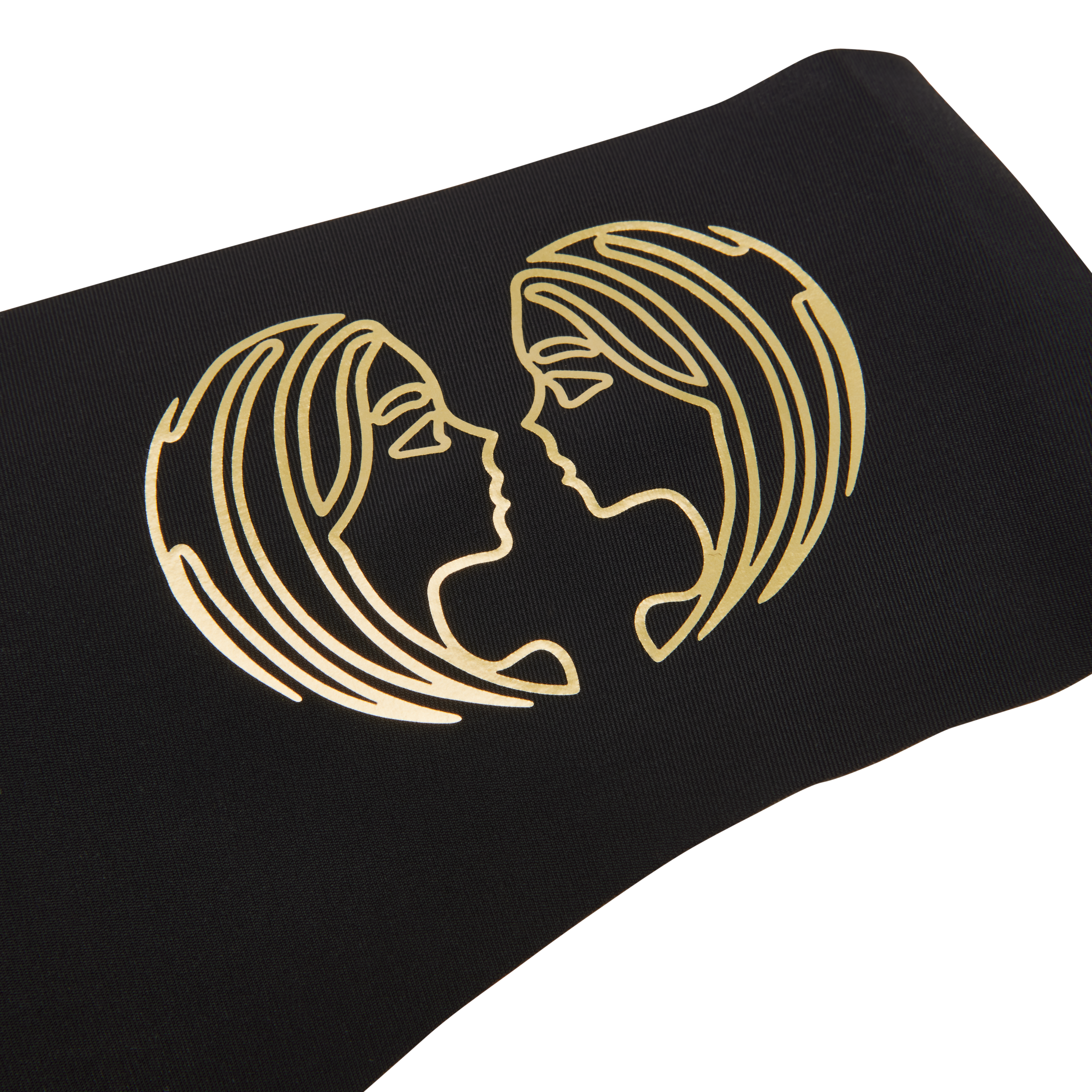 This image features a sleek, black thong with a distinctive metallic gold decal of a zodiac sign on the waistband. The thong is designed with a cotton gusset for superior hygiene and is constructed with thermowelded side seams and removable tags for comfort.