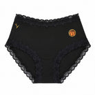 A pair of tap shoe black soft silk briefs with a embroidered basketball patch on the upper right hip, displayed against a solid white background.