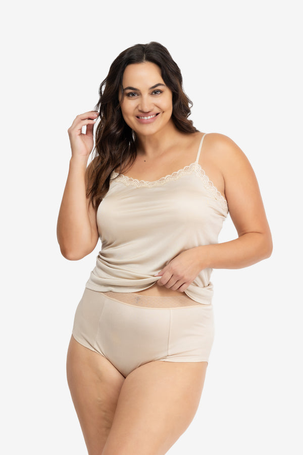 Model Wearing Uwila Warrior HIgh-Waist Silk Briefs Underwear in Smoke Grey on White Background
