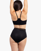 Model Wearing Uwila Warrior HIgh-Waist Silk Briefs Underwear in Tap Shoe Black on White Background