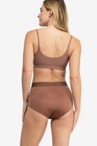 Model Wearing Uwila Warrior HIgh-Waist Silk Briefs Underwear in Toffee on White Background