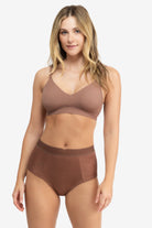 Model Wearing Uwila Warrior HIgh-Waist Silk Briefs Underwear in Toffee on White Background