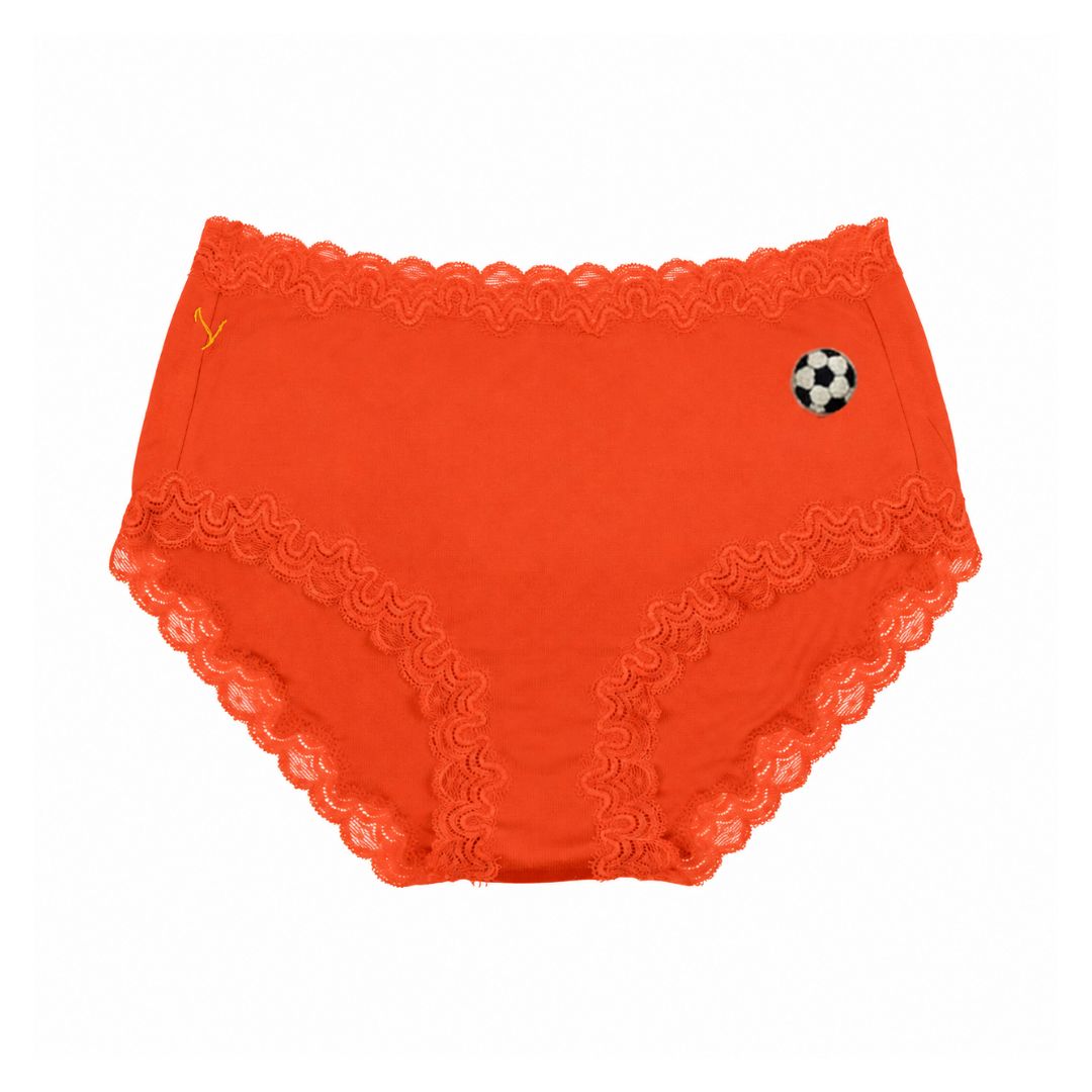 Uwila Warrior Soft Silk Briefs in Spicy Orange with Soccer Ball embroidered patch on white background. 