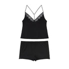 Black lace-trimmed camisole and shorts set on a white background