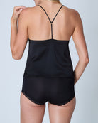 Black lingerie set with a plain background