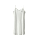 Still life of Uwila Warrior Silk Blend Slip  in Soft White on White Background