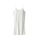 Still life of Uwila Warrior Silk Blend Slip in Soft White on White Background