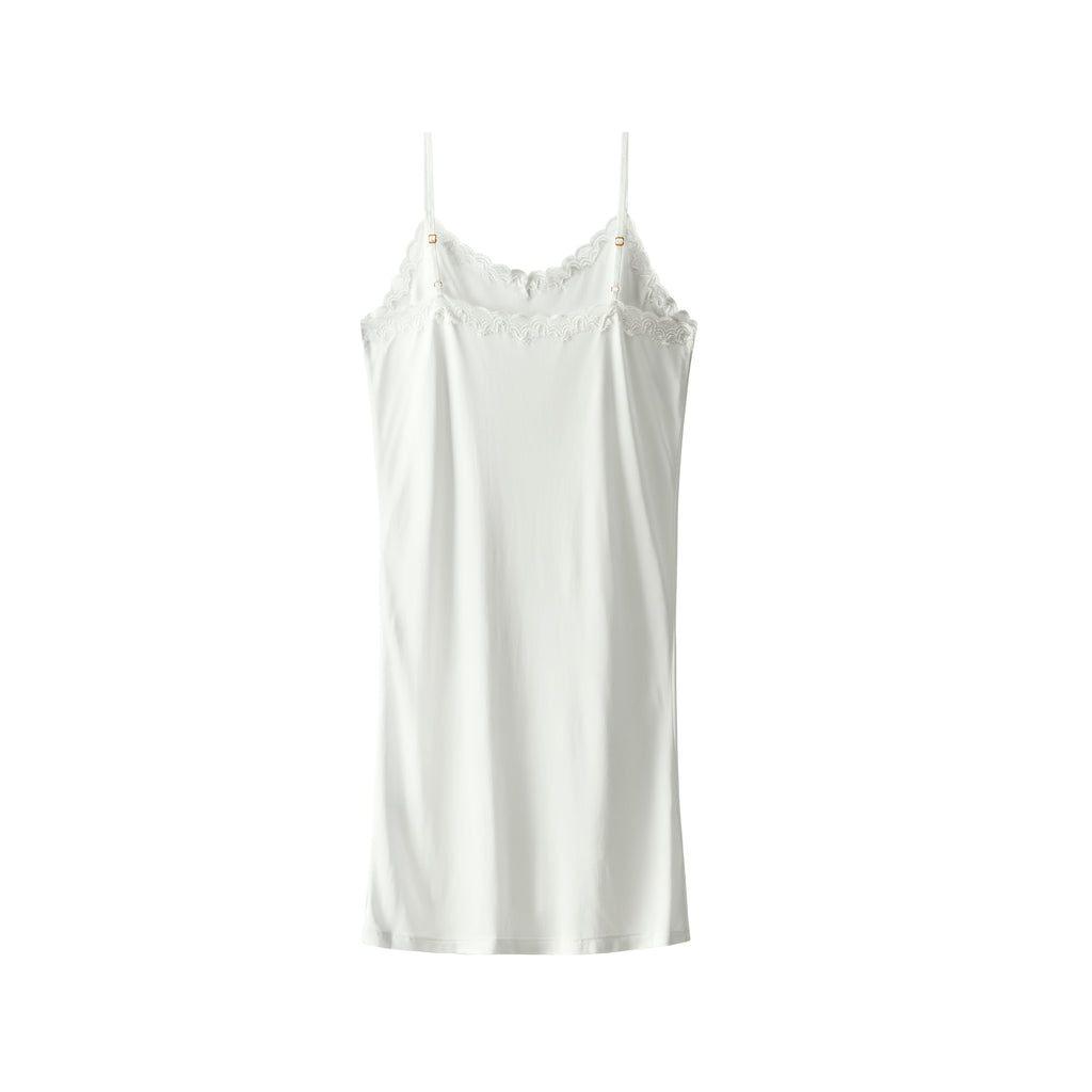Still life of Uwila Warrior Silk Blend Slip in Soft White on White Background