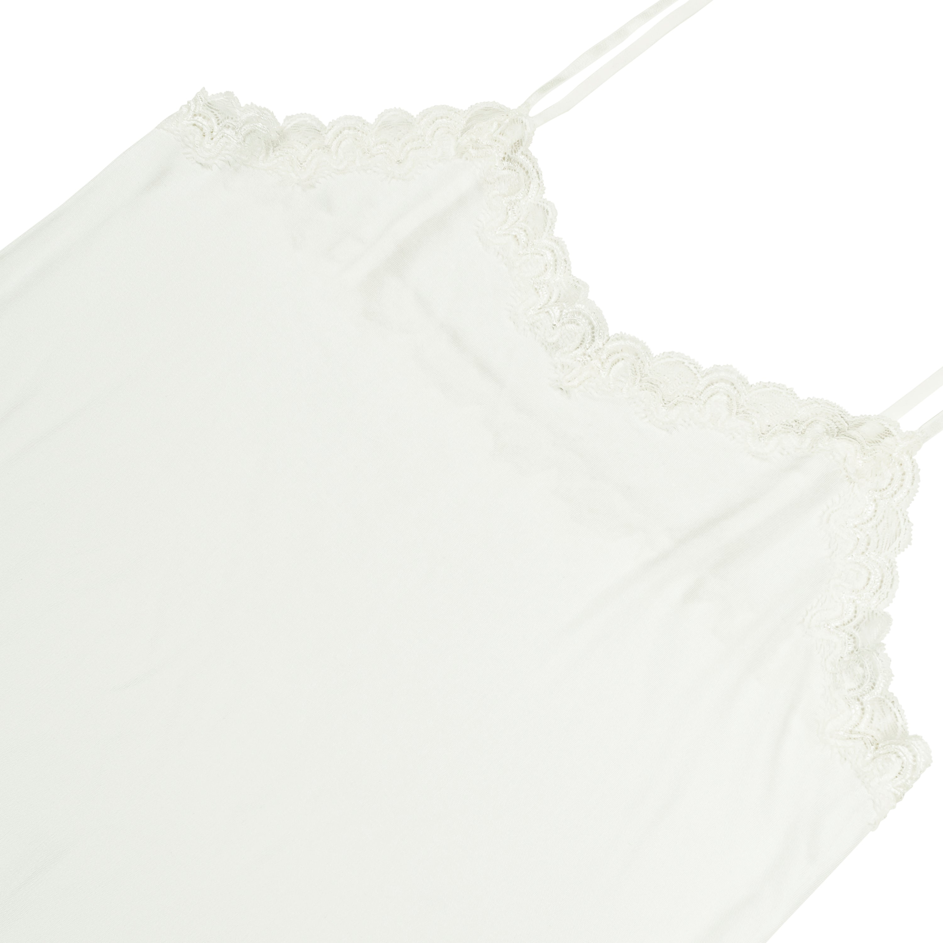 Still life of Uwila Warrior Silk Blend Slip in Soft White on White Background