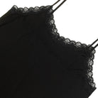 Still life of Uwila Warrior Silk Blend Slip in Tap Shoe Black on White Background
