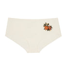 Soft Seamless Winter White Brief with orange embroidery on a white background