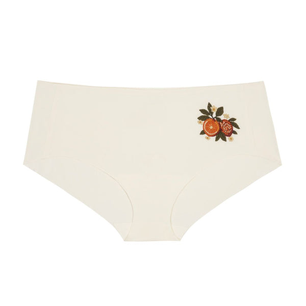 Soft Seamless Winter White Brief with orange embroidery on a white background