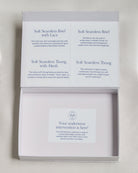 Packaging of soft seamless underwear with text on a light background