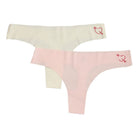 Winter White and Rose Quartz Soft Seamless Thong set with heart decal on white background. 