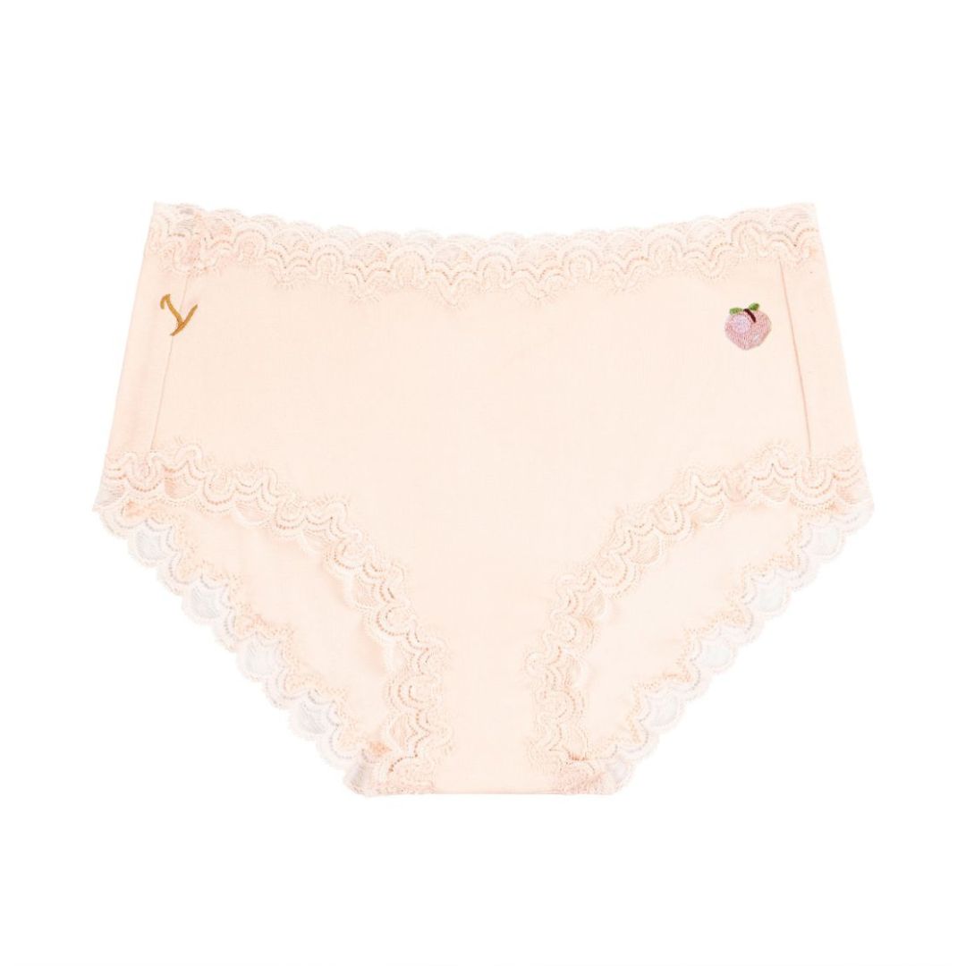Flay Lay of Uwila Warrior Soft Silk Rose Quartz Briefs with Peach Embroidered Patch