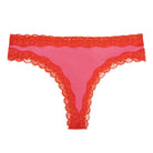Soft Silk Camelia Rose Thong with contrasting Fiery Red Lace on a white background. 