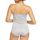 Model wearing Uwila Warrior Soft Silks Camisole in Alloy on White Background