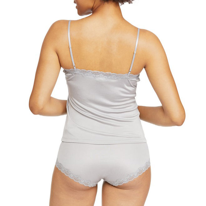 Model wearing Uwila Warrior Soft Silks Camisole in Alloy on White Background