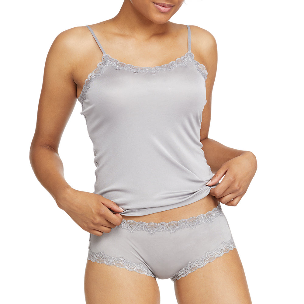 Model wearing Uwila Warrior Soft Silks Camisole in Alloy on White Background