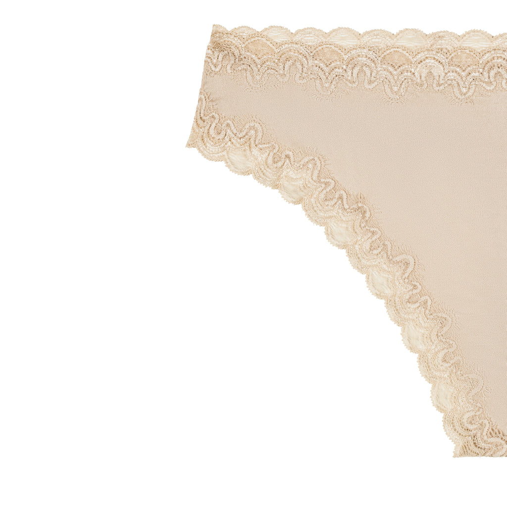 Still life of Uwila Warrior Soft Silks Thong Underwear in Smoke Grey on White Background