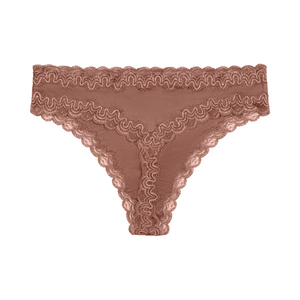 Still life of Uwila Warrior Soft Silks Thong Underwear in Toffee on White Background