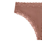 Still life of Uwila Warrior Soft Silks Thong Underwear in Toffee on White Background