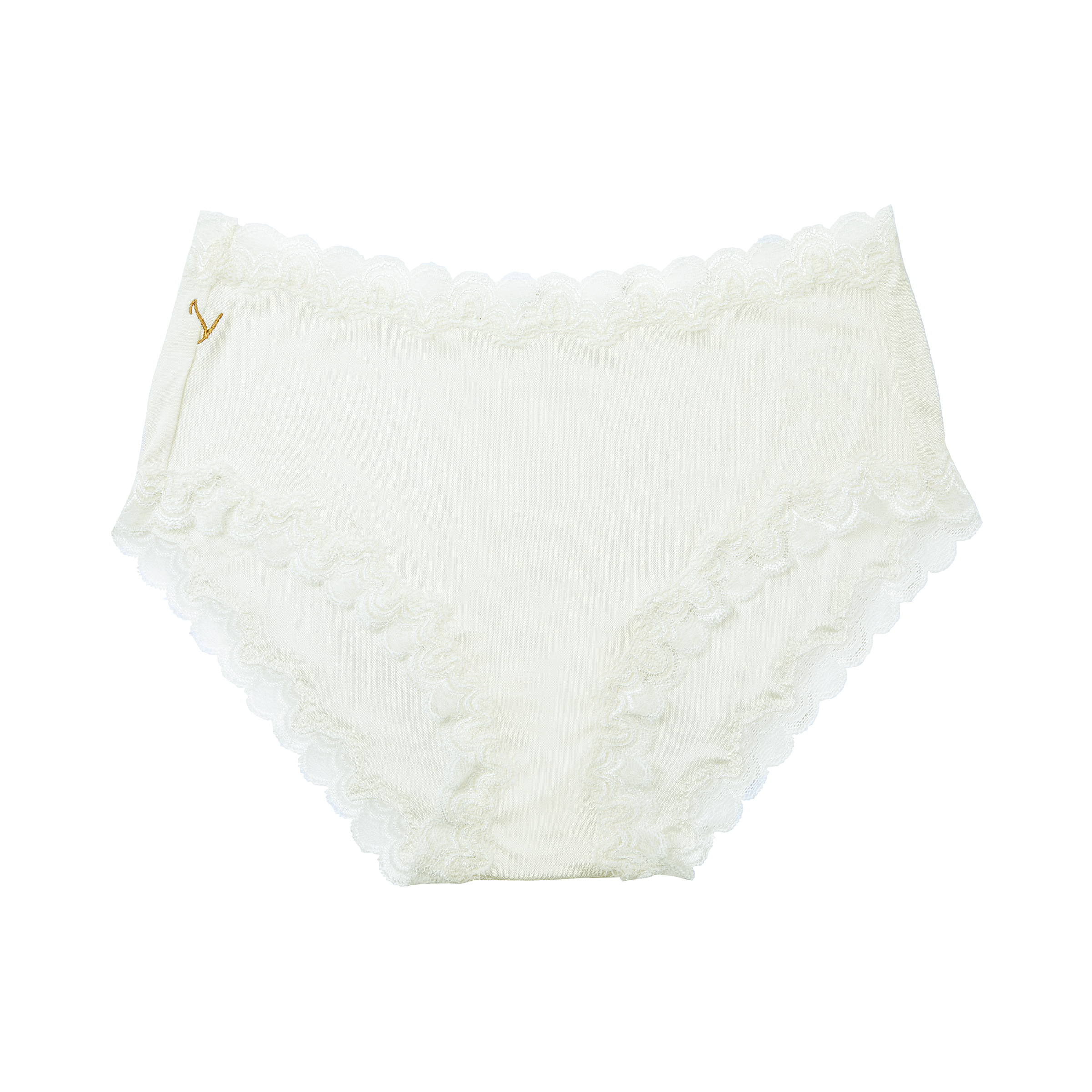 Still life of Uwila Warrior Soft Silks Briefs Underwear in Winter White on White Background