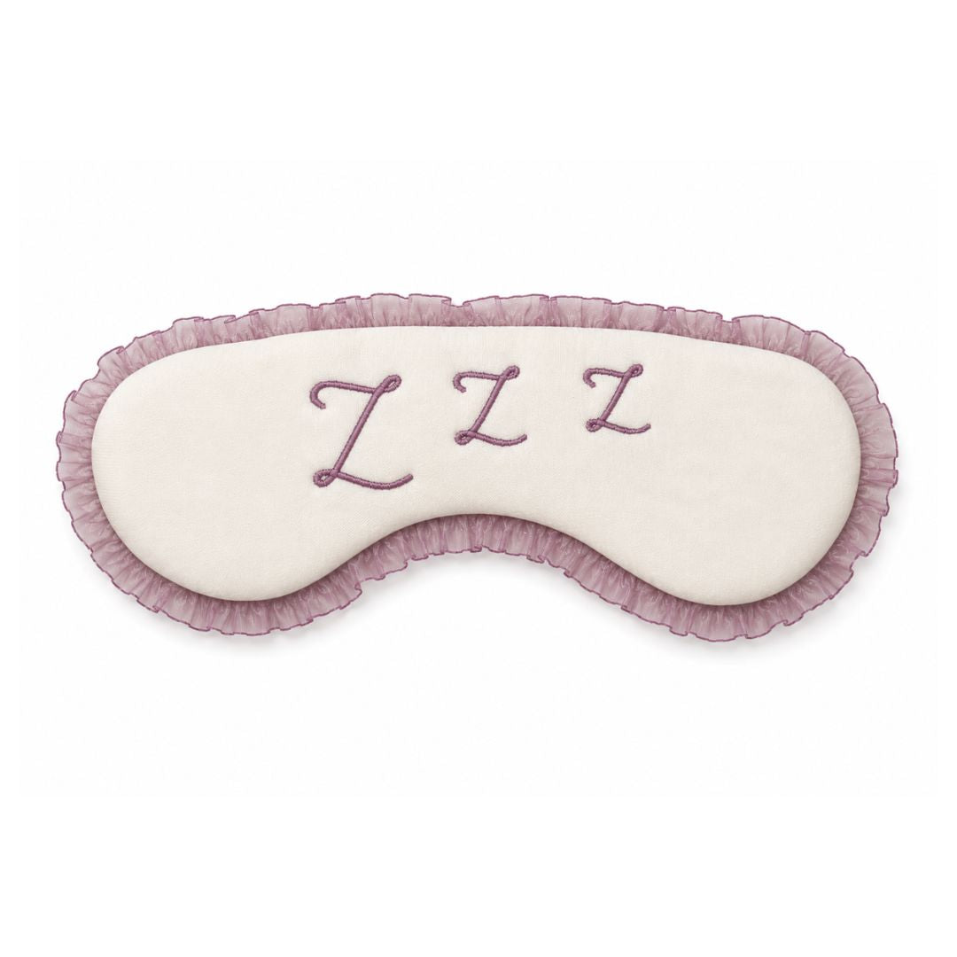 Flat Lay of Uwila Warrior Dream on Sleep Mask featuring ruffle trim and Zzz embroidery in Nirvana. 