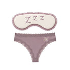 Flat Lay of the Uwila Warrior Sweet Dreams Travel Set featuring the Bon Voyage Silk Thong in Nirvana and the Sleep Mask. 